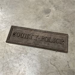 Whisky box, cast iron police sign, embossed brass wall hanging, two small oak cabinets