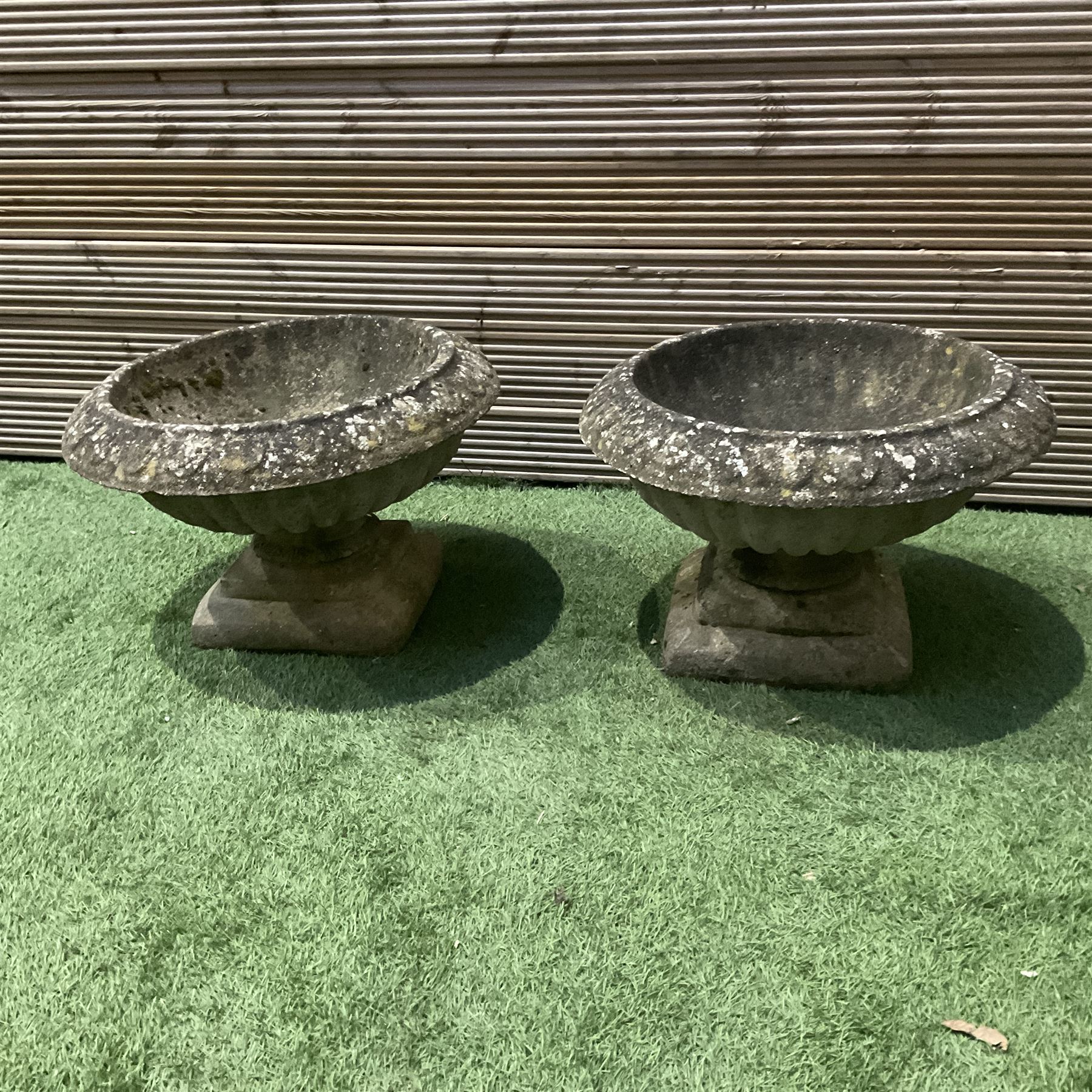 Cast stone garden planters on plinths - THIS LOT IS TO BE COLLECTED BY APPOINTMENT FROM DUGGLEBY STORAGE, GREAT HILL, EASTFIELD, SCARBOROUGH, YO11 3TX