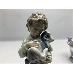 Six Lladro figures, comprising Naughty Dog no 4982, Best Friend 7620 and My Buddy no 7609, Kitty Confrontation no 1442, It Wasn't Me no 7672 and Rabbit Eating no 4772, three with original boxes, largest example H22cm