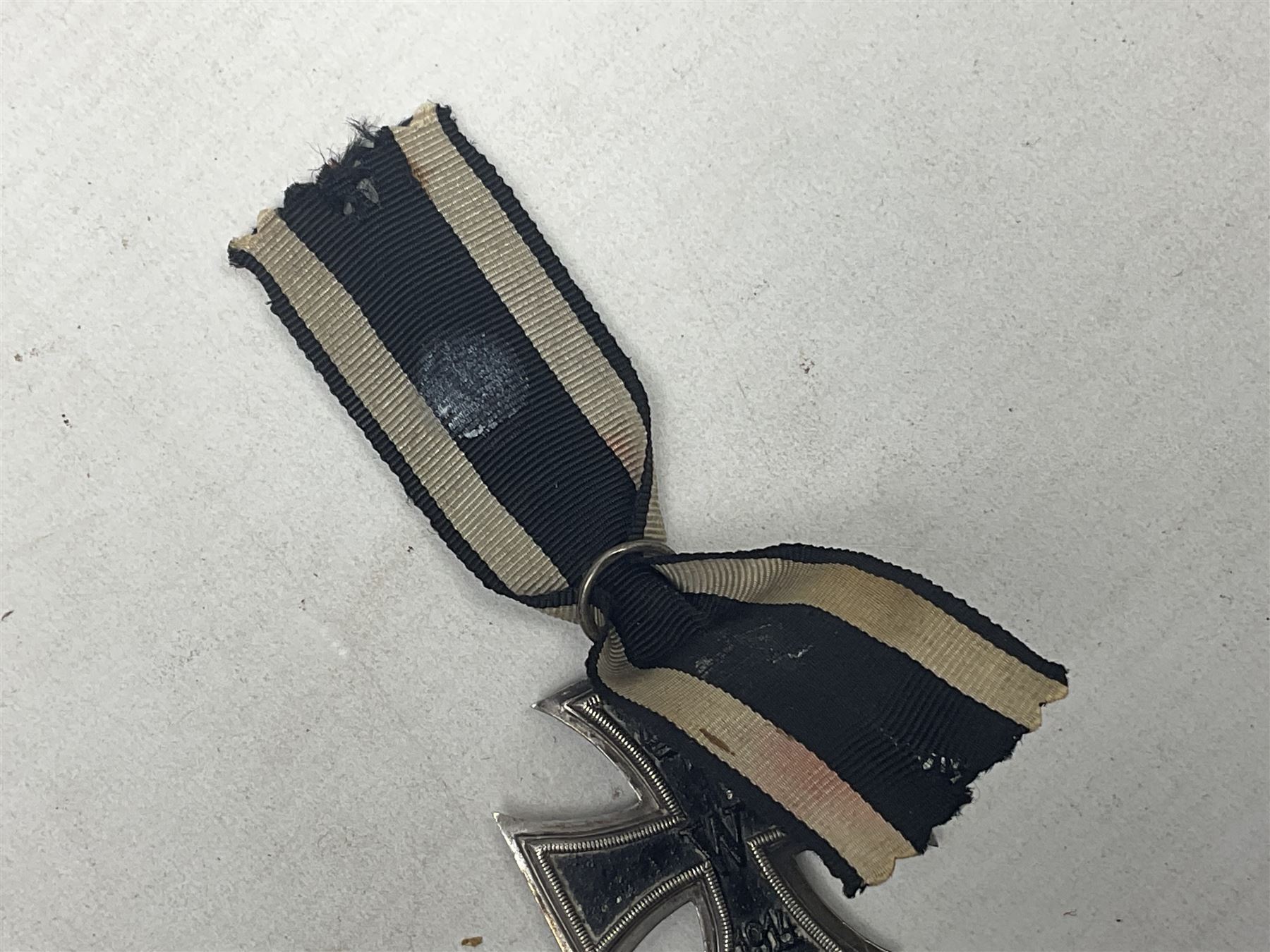 WW1 German Iron Cross 2nd Class with ribbon; ring indistinctly stamped