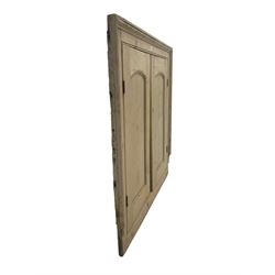 George III pine wall cupboard doors for architectural niche or cupboard, arched panelled doors, in moulded frame