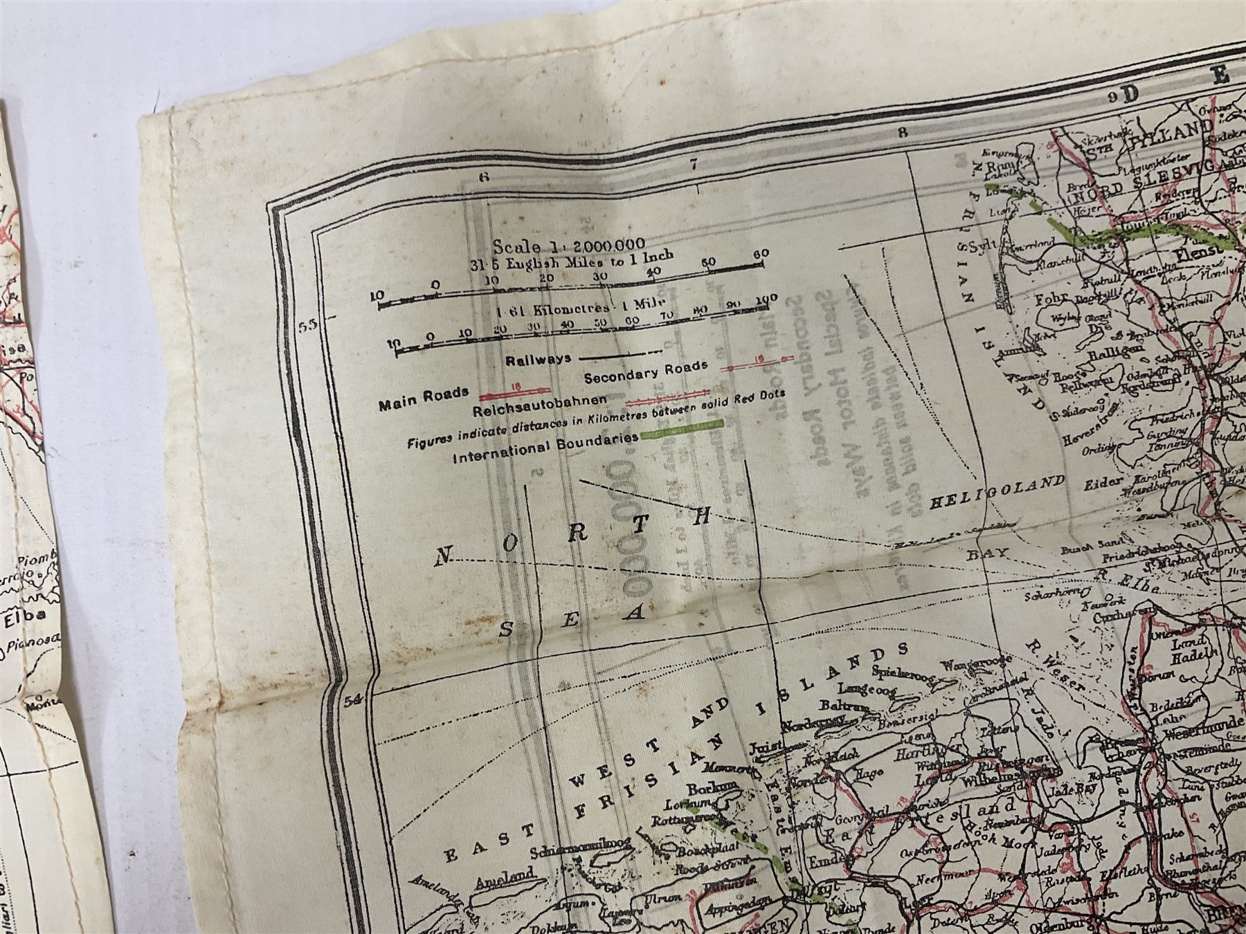 Two WW2 double sided silk escape and evade maps of Europe, comprising: Germany, Belgium, France, Holland, Spain etc,  in canvas envelope stamped Mark II