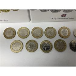 The Royal Mint United Kingdom mostly commemorative two pound, old round one pound and fifty pence coins, overall face value approximately 110 GBP, housed in three 'Coin Hunt' folders and loose