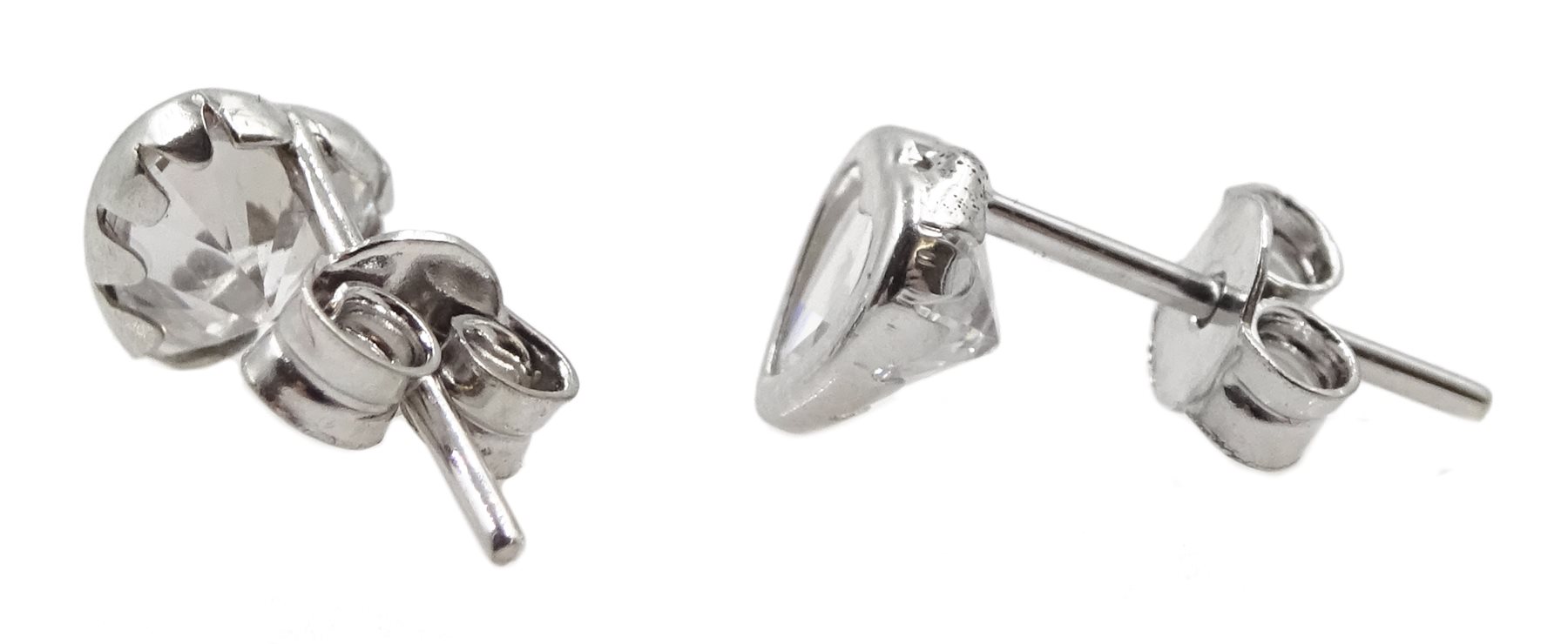 Pair of white gold cubic zirconia heart stud earrings, stamped 9K