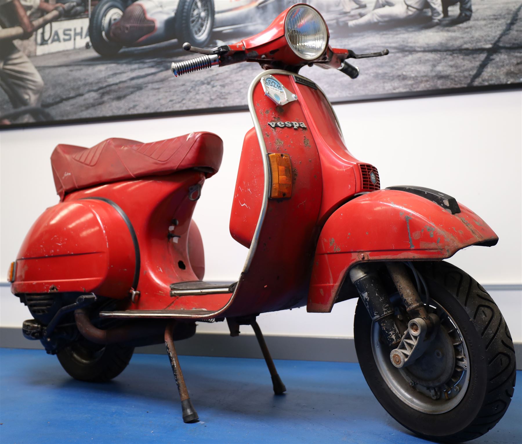 1979 Piaggio Vespa 200 Scooter

• Registration: TVY 25T
• Date of first registration: 1979
• Engine: 197cc petrol
• Odometer reading: 9,960 miles
• Colour: Red
• V5C: Present
• Keys: One

A 1979 Piaggio Vespa 200, registered TVY 25T and finished in red. Powered by a 197cc petrol engine, the scooter displays 9,960 miles on its Veglia Borletti odometer, although this mileage has not been independently verified.

The Vespa 200 is one of the larger-capacity models in the classic Vespa range, combining the marque’s distinctive pressed-steel construction with a practical 197cc engine and traditional handlebar gear change.

This example is presented in largely original and unrestored condition, retaining its period bodywork, Piaggio and Vespa badging, original-style controls and Yankee-branded dual seat.

The scooter shows extensive age-related wear throughout, including paint loss, scratches, surface corrosion and deterioration to the bodywork, including a perforation to the inner legshield.

This vehicle forms part of the Estate of the Late John Sills and is offered for sale by the Executors, confirming a genuine reason for sale.