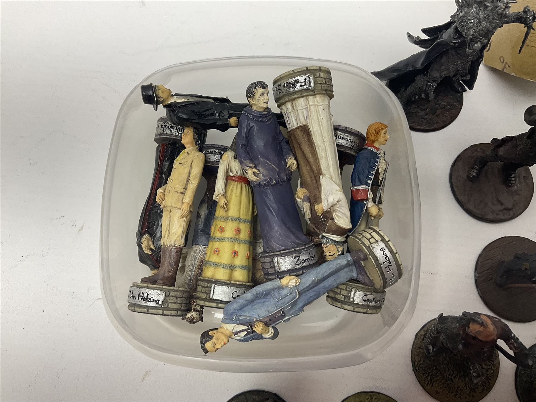 Approximately 80 NLP Lord of the Rings heavy metal painted figurines to include Fell Beast, boxed, and The Watcher, The Dark Lord Sauron, Treebeard etc, and unassociated Dracula themed composite figures marked HHFT50 