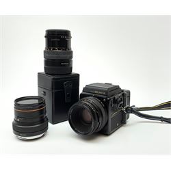 'Zenza Bronica SQ-B' camera fitted with 'Zenza Bronica Zenzanon-PS 1:28 f=80mm' lens, 'Zenza Bronica Zenzanon-PS 1:4 f=150mm' lens and 'Zenza Bronica Zenzanon-S 1:35 f=50mm' lens, with an instruction booklet