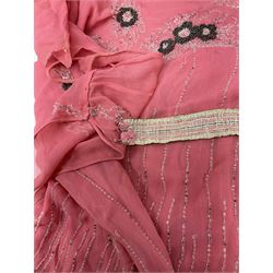 Art Deco pink flapper type beaded dress, with floral motifs and tasselled clear and black beadwork throughout