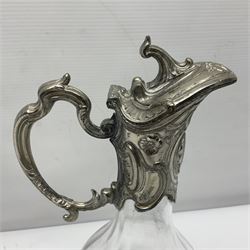Silver plate mounted blue glass claret jug of ovid form, with C scroll handle, together with two other silver plate mounted claret jug