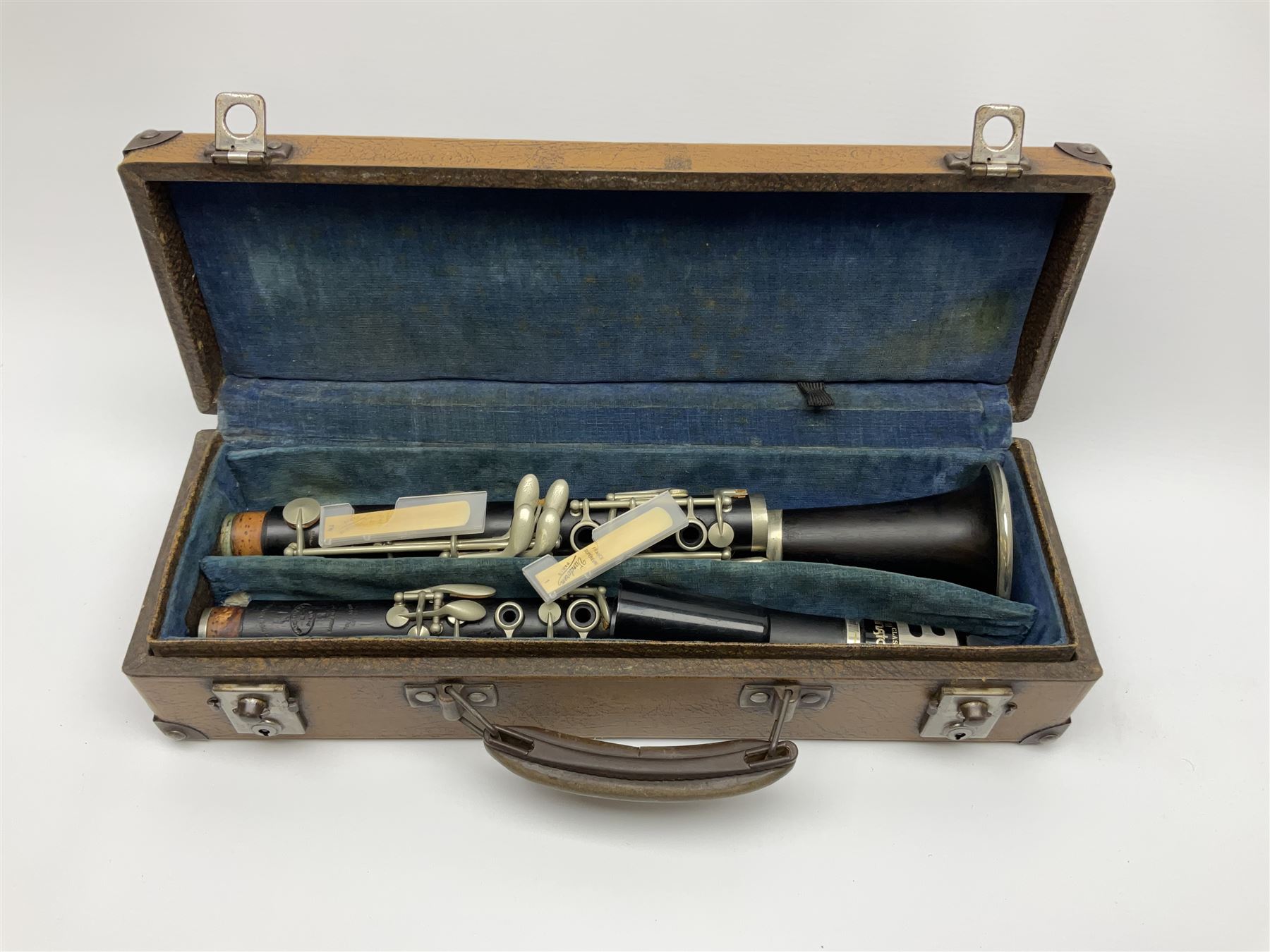 Buffet Crampon Paris African blackwood four-piece clarinet with nickel fittings, impressed 'BCPB 1937', multiple stamps for 'Macdonough & Son Sole Agent London' L67cm; in rexine covered case with two unused reeds. Biographical information: The Macdonagh family have links with the Royal Philharmonic Orchestra and are also reputedly linked with Thomas Macdonagh who was involved in the 1916 Irish uprising.