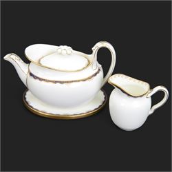 Wedgwood tea service, comprising teapot and stand, hot water jug, milk jug, open sucrier, twelve side plates, two sandwich plates, twelve cups and eleven saucers 