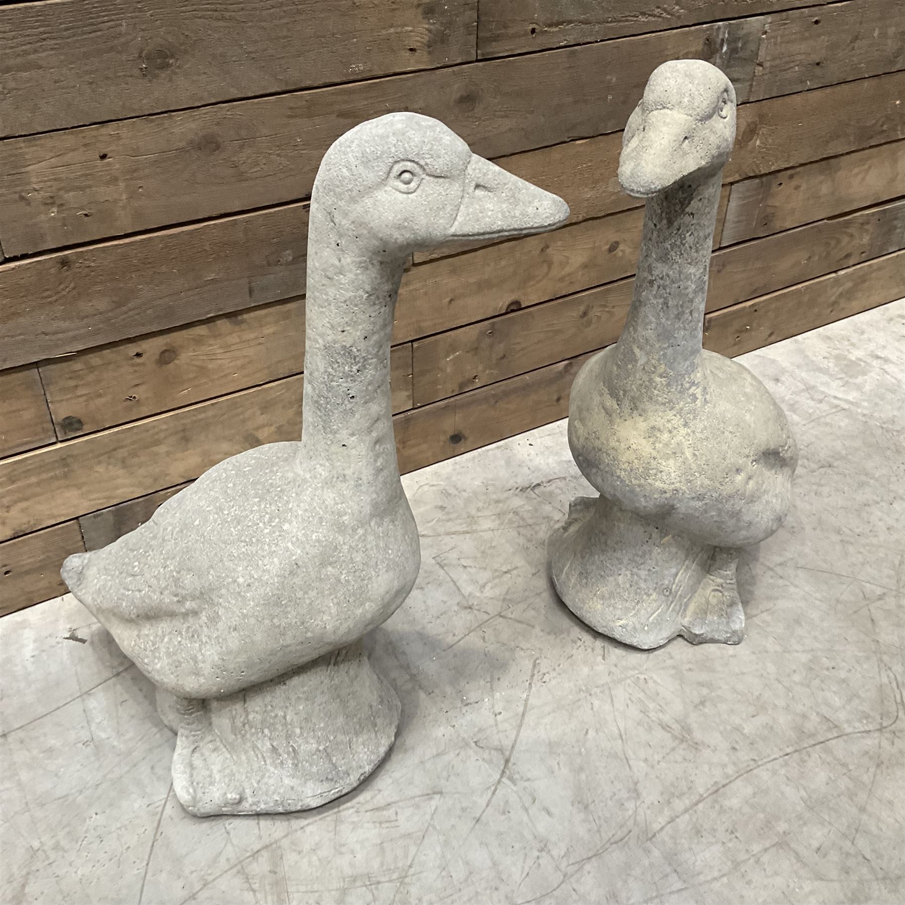Pair of cast stone garden geese