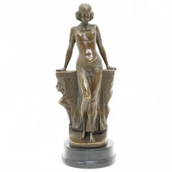 Bronze figure of an Egyptian lady wearing a shendyt, signed Milo and with foundry mark, H25cm 