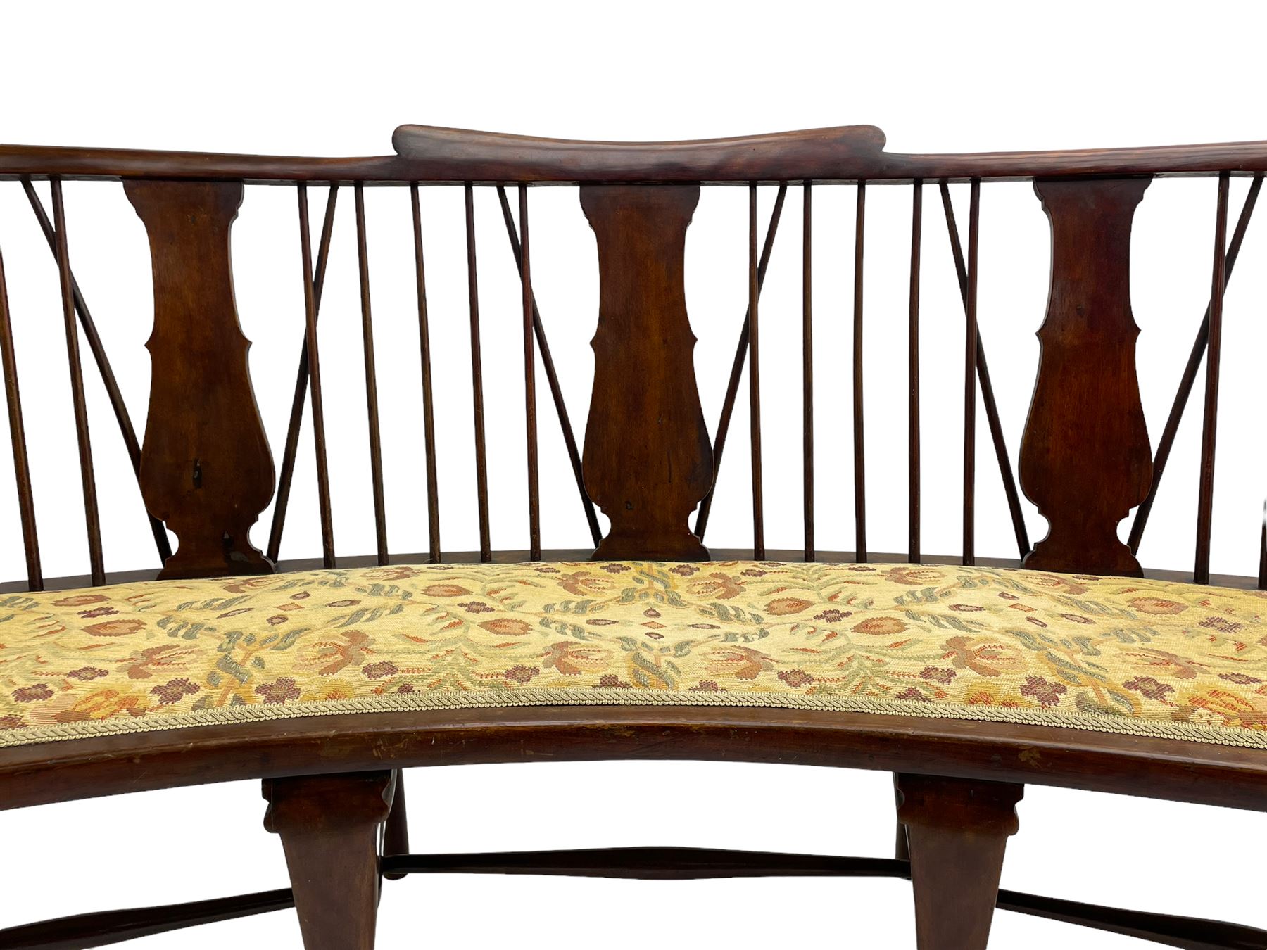 Georgian design curved Windsor settee or settle, shaped cresting rail over triple vase shaped splats and stick back, upholstered seat, on cabriole front supports joined by a series of swell turned stretchers