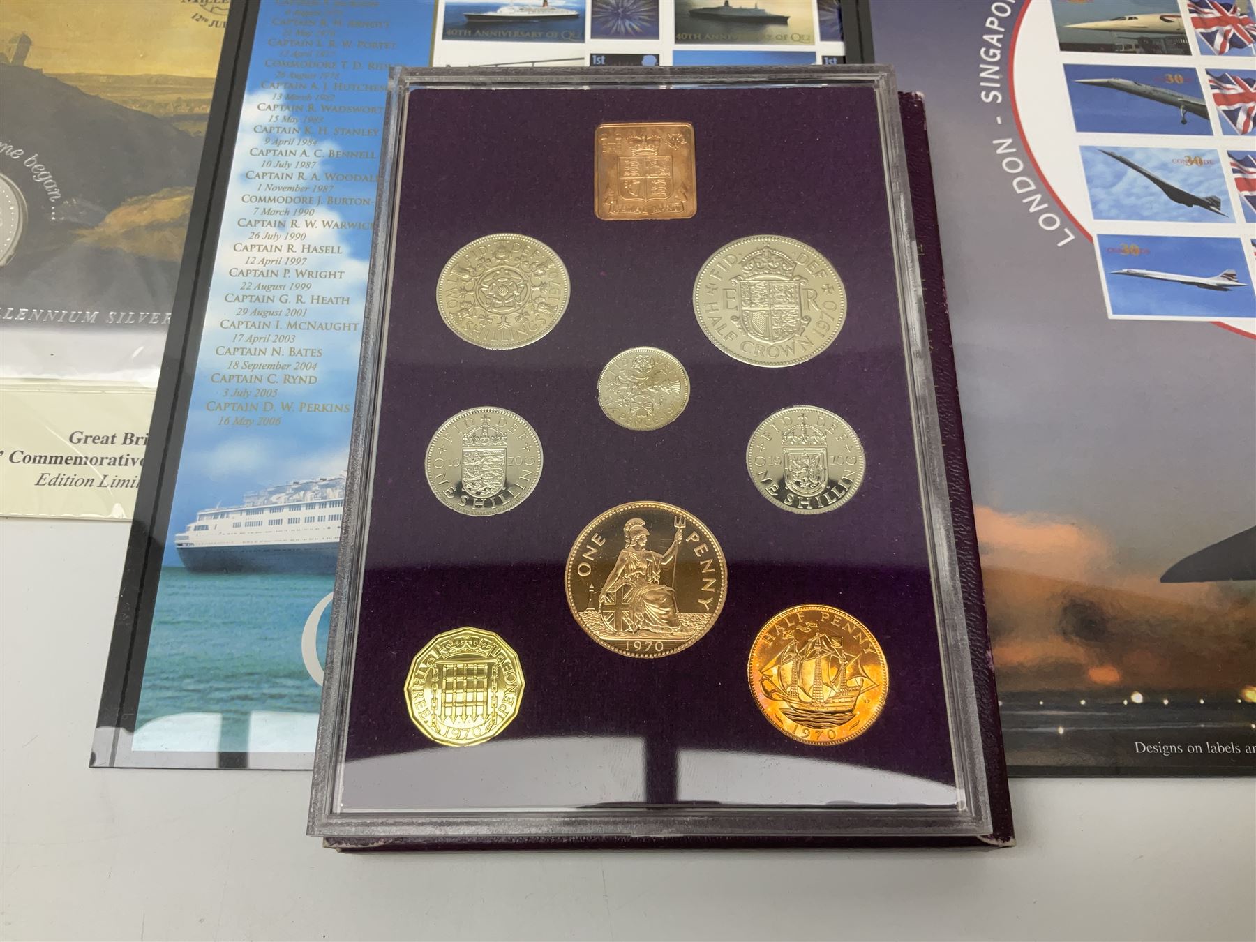 Coins and stamps, including The Royal Mint Great Britain 1970 coin set in plastic holder, 2006 'Brunel' coin cover containing two commemorative two pound coins, Alderney 2006 sterling silver proof five pounds, two 2007 five pound coins in card folders, two limited edition mint first class stamp sheets each comprised of ten first class stamps, various first day covers many with special postmarks housed in 'Royal Mail' boxes etc