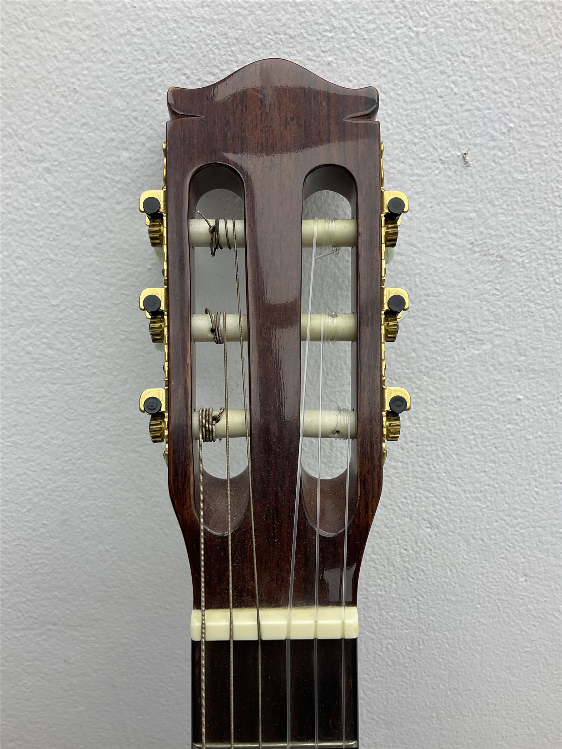 Nagoya Suzuki Model SC240 acoustic guitar with mahogany back and ribs and spruce top, bears label, L101cm; in soft carrying case