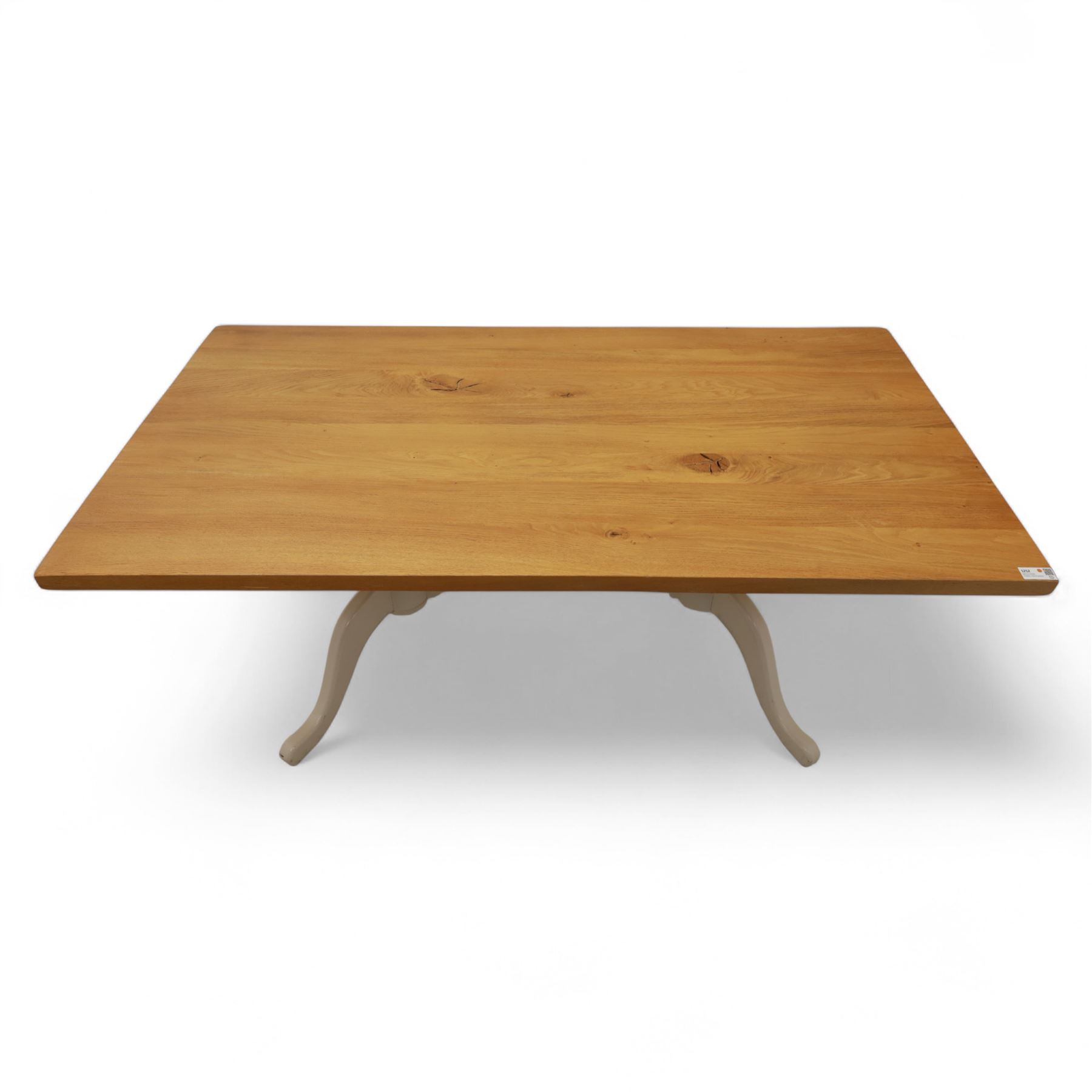 Contemporary light oak dining table, painted tripod bases with stretcher 