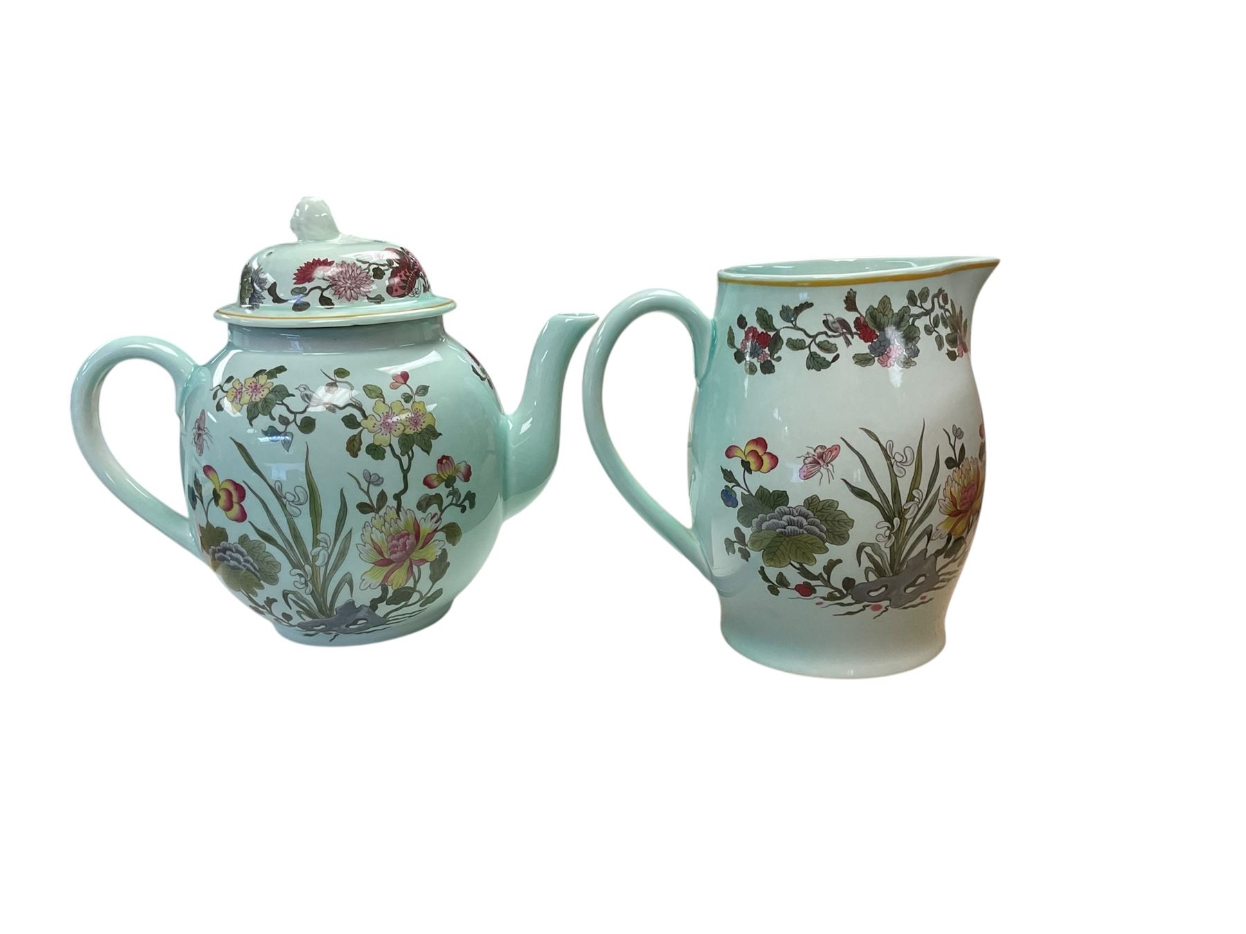 Adams part dinner service, decorated with flowers on a green ground, including six dinner plates, milk jug, tea pot, serving plates etc, in two boxes   