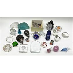 A group of assorted paperweights, to include examples modelled as various animals, including an Art Glass penguin, Art glass hippo, and Hedgehog marked Wedgwood, plus Canadian blue glass example of naturalistic form decorated with polar bear, Kosta Crystal example modelled as a Hedgehog, etc. (26). 