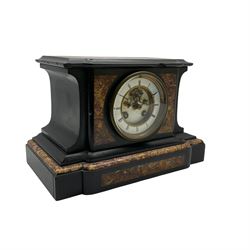 A French eight day striking mantle clock in a Belgium slate case with panels of contrasting variegated marble to the top and front, flat topped break-front case on a corresponding wide plinth, enamel two-piece dial with a visible “Brocot” dead beat escapement and jewelled pallets, steel moon hands within a flat bevelled glass and cast brass bezel, rack striking movement striking the hours and half-hours on a bell. With pendulum.


