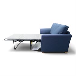 Contemporary blue small sofa bed, shaped arms with loose seat cushions, stowed bed beneath, raised on light wood feet