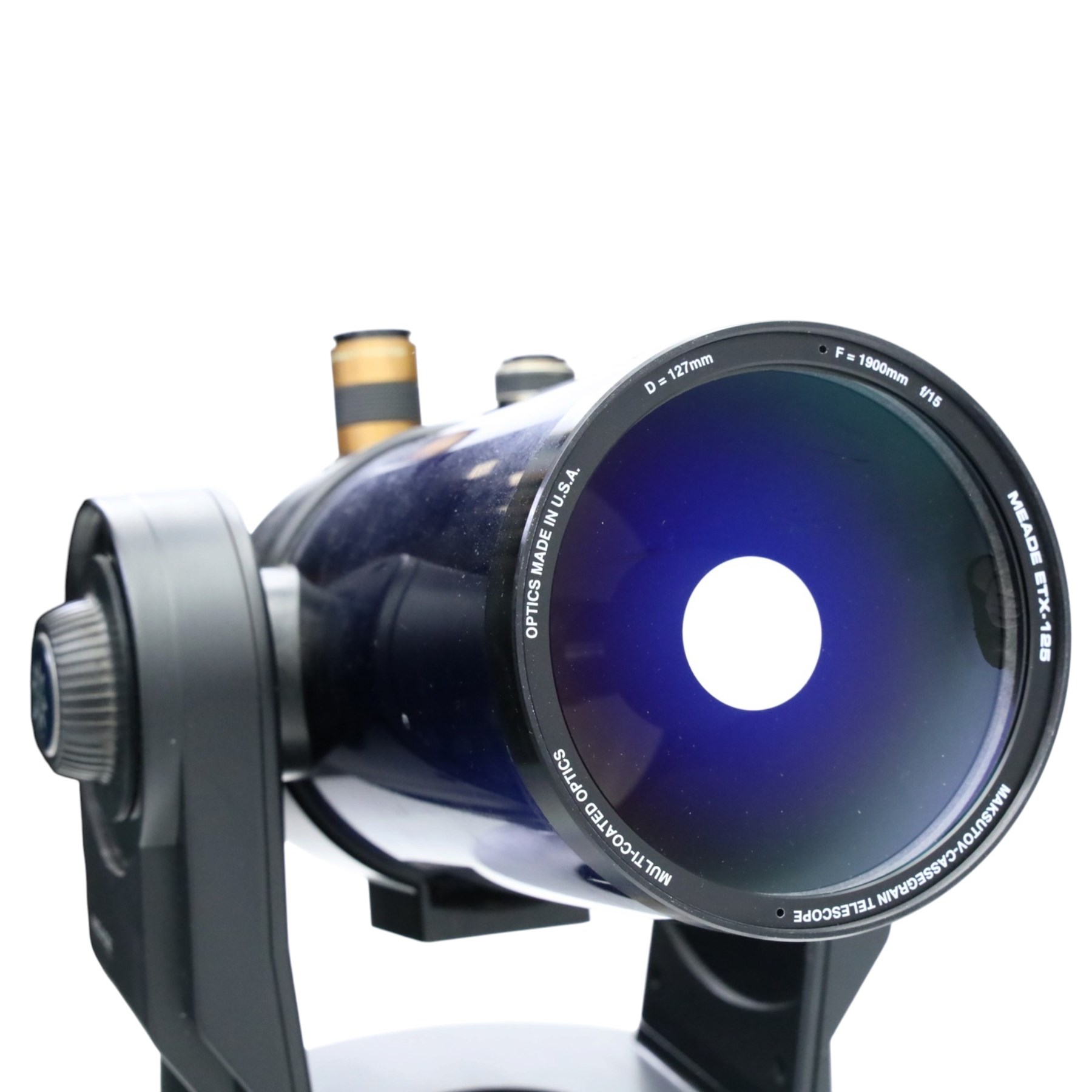Meade ETX-125 telescope, reflector telescope with tripod, Autostar controller and seven eyepieces, contained in a Meade flight case