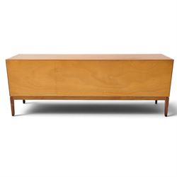 Robert Heritage (1927-2008) for Archie Shine - Large rosewood sideboard, with a central bank of three drawers flanked by a cupboard either side, raised on square tapering supports
