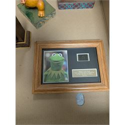 Collection of Disney and similar figures and memorabilia, including Pirates of the Caribbean Capt Jack Sparrow talking figure and NECA toys Jack Sparrow Head Knocker, three Disney showcase figures, Kermit the Frog framed film cell and Tomb Raider figure