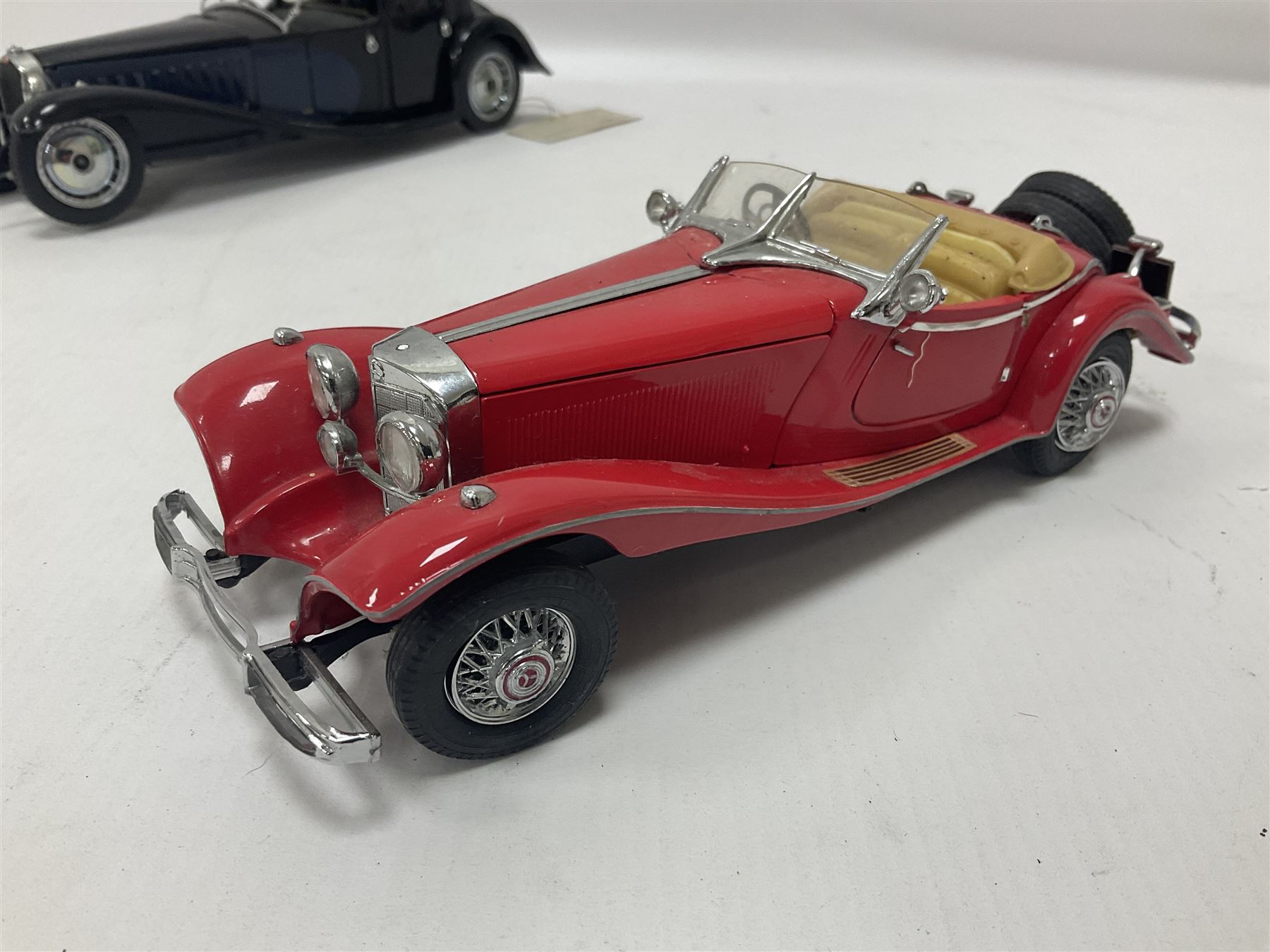 Franklin Mint - five 1:24 scale die-cast precision models comprising 1930 Bugatti Royale Coupe Napoleon, 1933 Duesenberg SJ Twenty Grand, 1935 Mercedes Benz 500K Special Roadster, 1938 Jaguar SS-100, and 1947 Bentley 