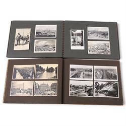 Two early to mid 20th century postcard albums, containing black and white and colour postc...