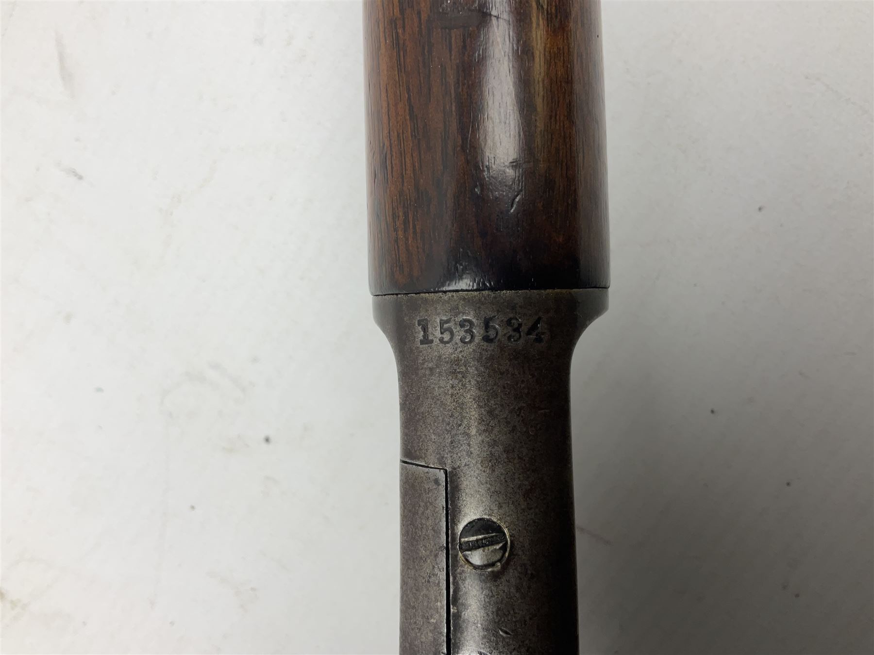 Marlin Firearms Co. USA 'Safety' .32 rim-fire rifle dated 1892, the 61cm barrel with magazine tube under, walnut stock with under lever cocking and crescent butt plate, serial no.153534, L103.5cm