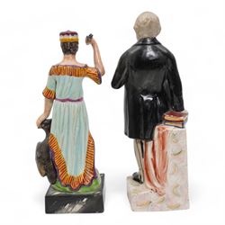 19th Century Staffordshire pearlware figure modelled as Jupiter stood beside a raven, stood upon a faux marble base, painted in bright polychrome enamels, H28cm together with a Staffordshire figure of William Ewart Gladstone (2)