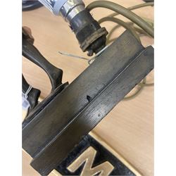 Art Deco style table lamp, modelled in the form of a bronzed female figure before a leaded glass fan shaped shade, H38cm