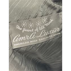 Modern cut lightweight skins lavender blue mink jacket, approx size 10 to 14, with elasticated cuffs, stand up small collar, black satin style lining, zip fastener, perfect condition as new, top class mink.
