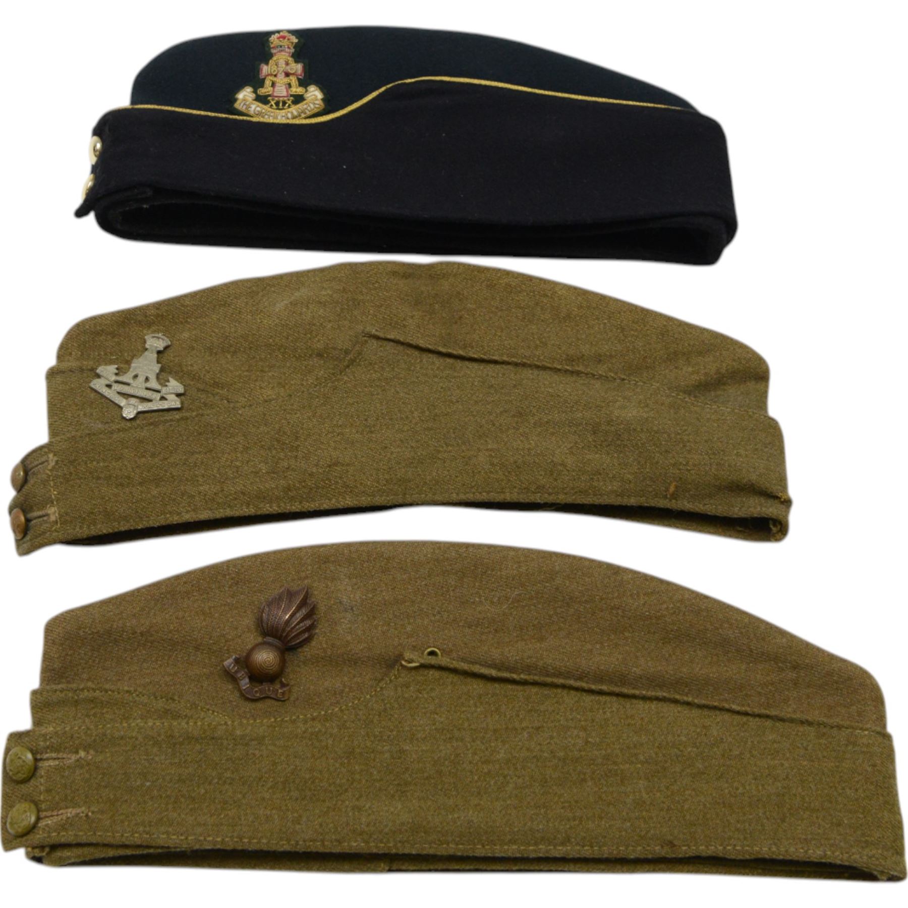 Collection of military caps, including Green Howards forage cap by Herbert Johnson, Officer's Royal Artillery cap by Bates Hatters, Glengarry cap by Mackie and Co etc 