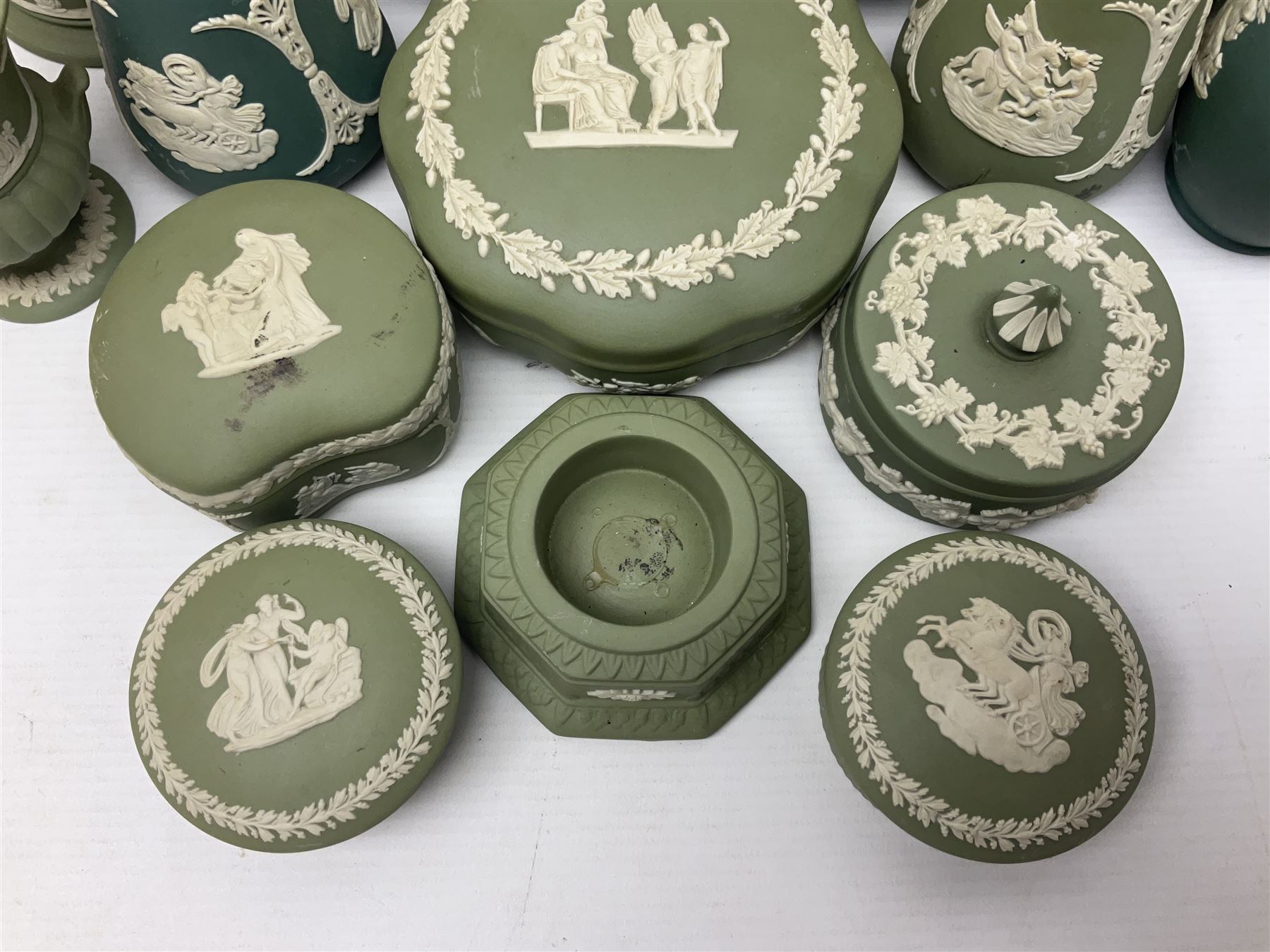 Collection of  Wedgwood green Jasperware, to include large jug, vases, trinket dishes, etc together with two teal Jasperware vases 