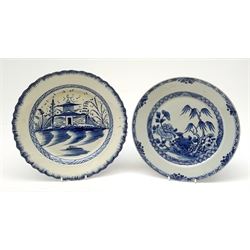 A late 18th/early 19th century pealware plate, with central pagoda decoration and feathered rim, D24.5cm, together with a 19th century Chinese willow pattern plate, D22.5cm. 
