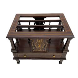 Victorian style rosewood three division Canterbury, the moulded surround supported by square tapered columns and pierced splats inlaid with bell flowers and musical instruments, fitted with single drawer, on square tapering supports with spade feet, boxwood stringing 