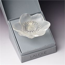 Lalique Lions Head glass ashtray and an 'Anemone' flower, both marked Lalique, France and boxed (2)