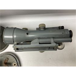 Cooke Troughton & Simms grey painted brass dumpy level in carrying case; and WW2 British .303 Vickers Machine Gun brass Clinometer, stamped 'V.E. 0067' serial No. 2370,  dated 1944 unboxed (2)