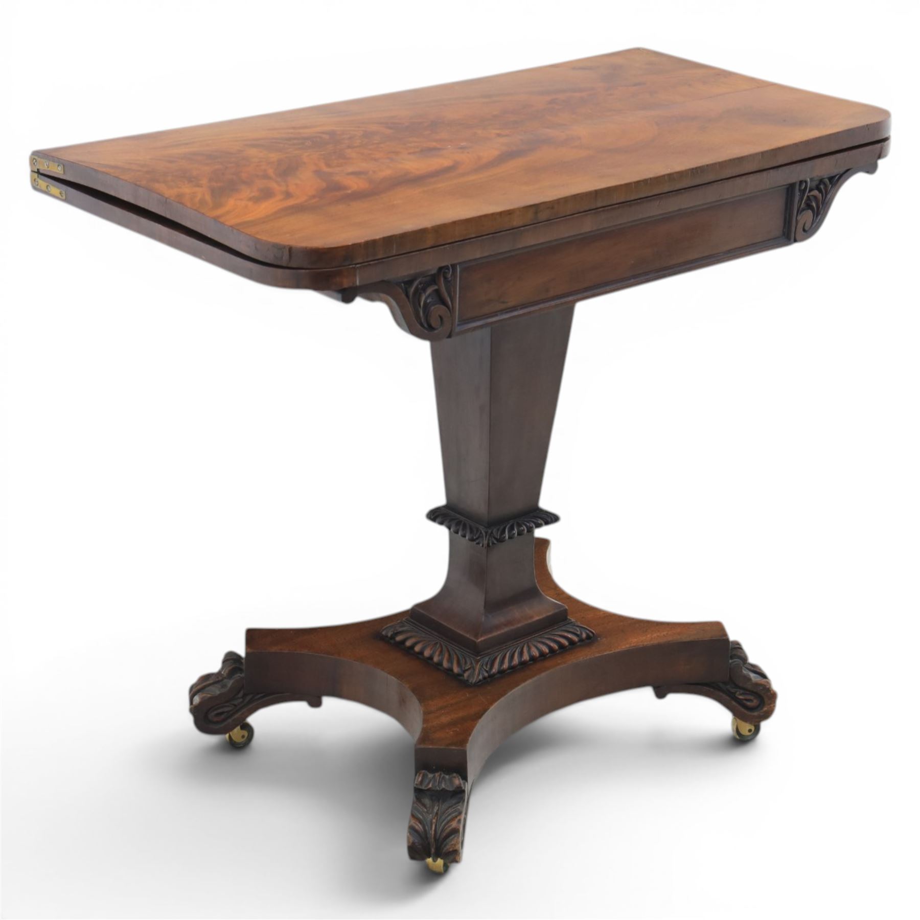 Victorian figured mahogany side table, fold-over swivel extending top, tapering square column above quatrefoil base