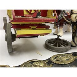 Two ceramic shire horse and gypsy caravans, together with horse brasses 