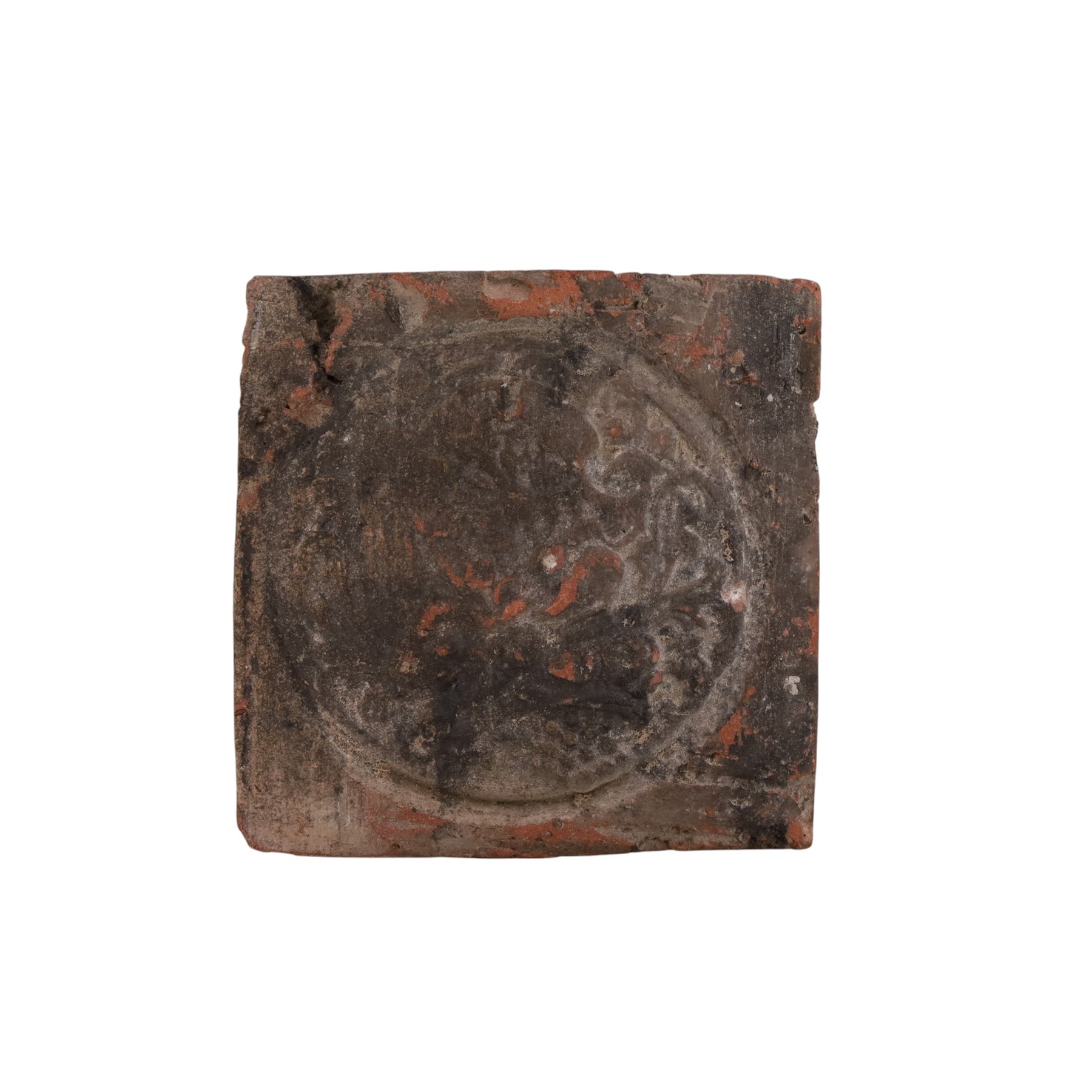 Three medieval tiles, decorated in relief, H10cm