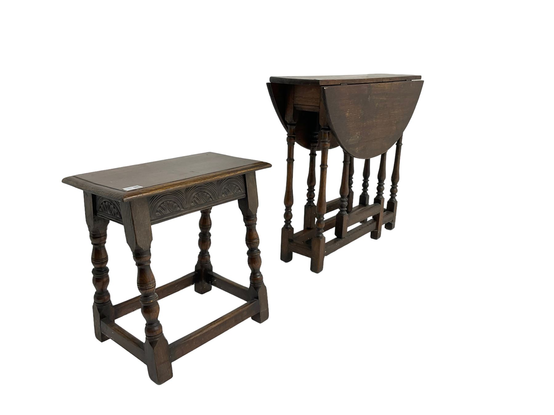 17th century design oak coffin or joint stool, rectangular top over lunette carved frieze rail, raised on turned supports (W46cm D26cn H45cm); and 19th century small oak drop-leaf gateleg table, circular top raised on turned supports (W80cm H67cm)