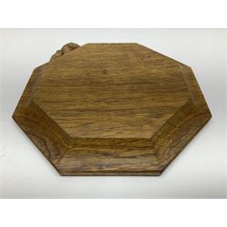 Mouseman - oak octagonal chopping board or teapot stand, moulded edge carved with mouse signature, by the workshop of Robert Thompson, Kilburn