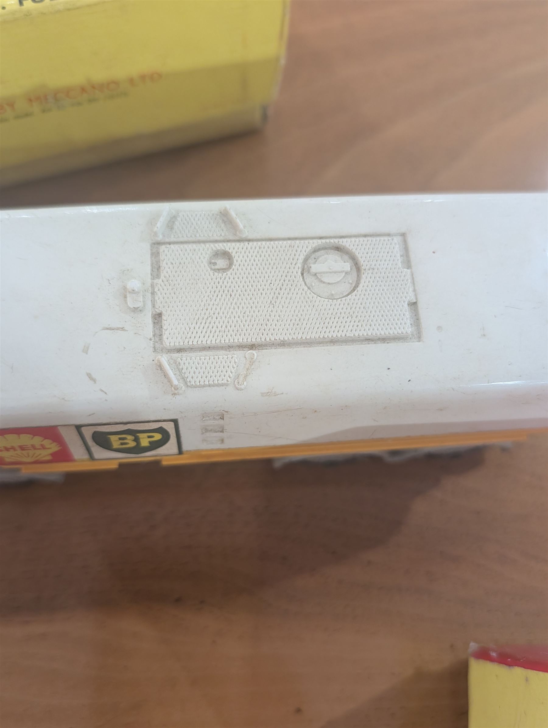 Three Dinky Toys diecast vehicles, comprising Field Marshall Tractor no. 301, Shell BP Fuel Tanker no. 944 and Snow Plough no. 958, all boxed