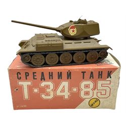 Various Makers - military vehicles comprising Schuco Kubelwagen and two Russian tanks, all boxed; and quantity of unboxed and playworn models including five Crescent Field Guns and Ammunition Limbers, Crescent Heavy Rescue Crane, Johilco Mobile Searchlight, Britains German Army BMW Combination, two Skybirds trucks etc; and a tin-plate armoured car.