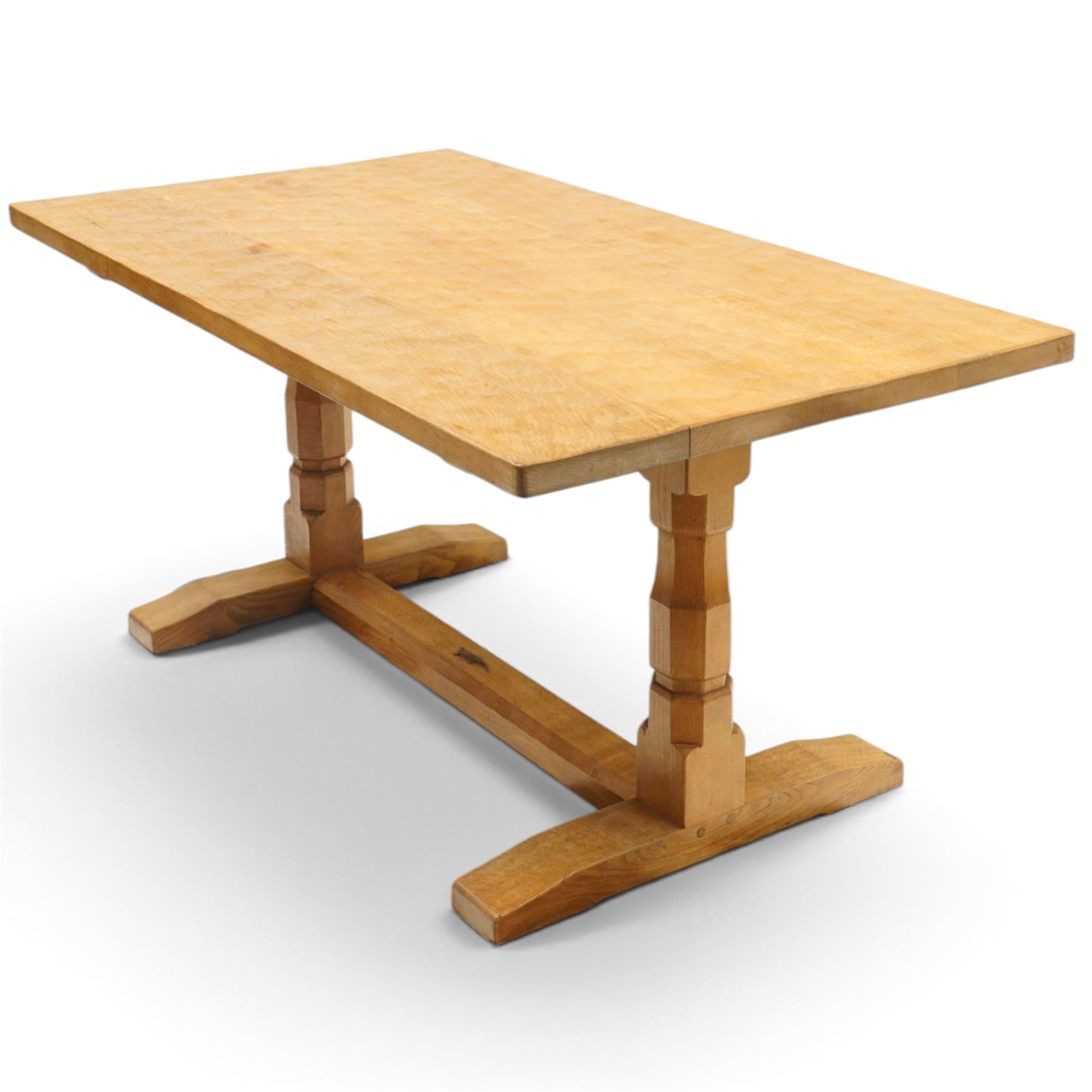 Lizardman - 5' oak refectory dining table, rectangular adzed top, octagonal turned supports united by stretcher with carved lizard signature, by Derek Slater of Crayke