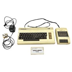 Commodore Vic 20 colour computer with power supply together with Commodore Datassette and Super Lander VIC 1907 game cassette