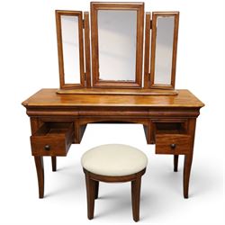 Willis & Gambier - mahogany dressing table, three part mirror and stool, the dressing table with rectangular top with chamfered corners, over two baize lined frieze drawers, kneehole recess and a single drawer either side, three part mirror with central tilting mirror on a moulded plinth base, with oval beige padded stool 